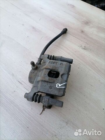 Суппорт задний правый Mitsubishi Lancer 9