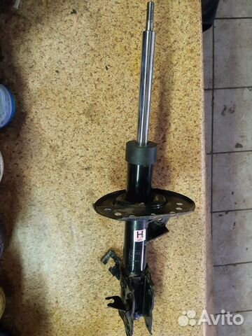 Амортизатор передний левый Nissan X-Trail T31