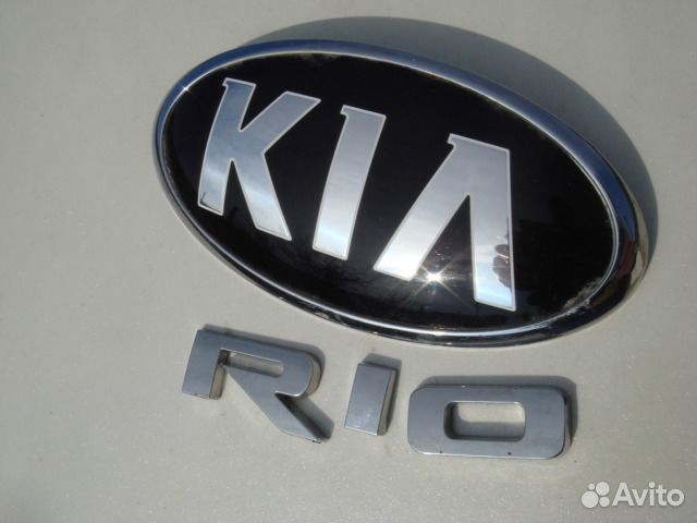Киа Рио 4 Эмблема крышки багажника Rio 4 17-нв Киа Рио 4 Эмблема крышки багажника Rio 4 17-нв