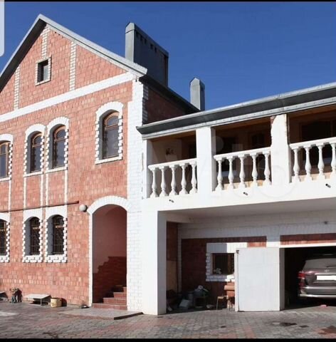 Коттедж 276 м² на участке 7 сот.