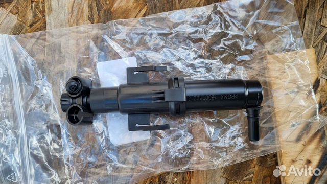 Форсунка омывателя фары Новая BMW 61677149885