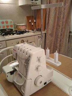 Оверлок janome 724 D новый