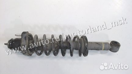 Амортизатор подвески левый задний Mitsubishi Outla