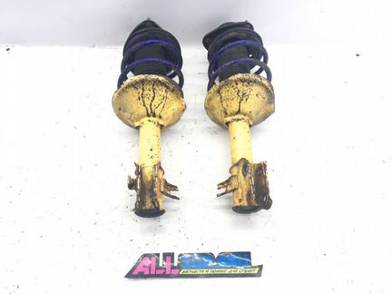 Амортизатор, стойка передняя передний Subaru